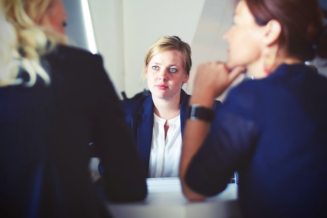 Business women talking in a conference room
